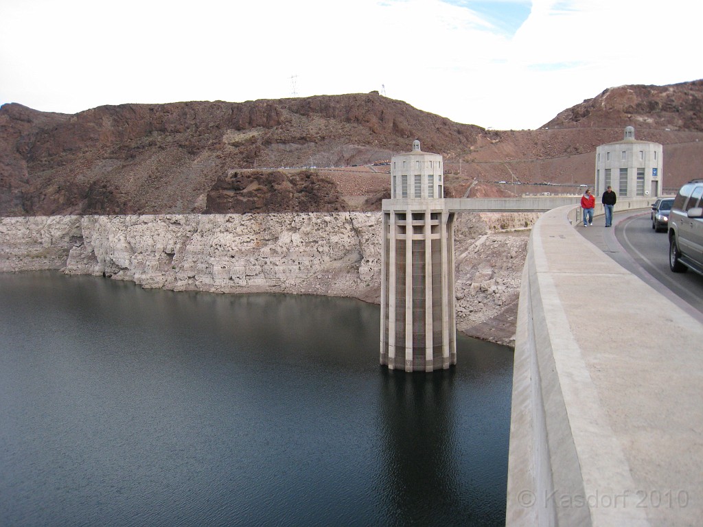 Las Vegas 2010 - Hoover Dam Revisited 0321.JPG - A prolonged dry spell, lasting over a decade, is steadily draining the water sources that power Hoover Dam’s giant turbines and has left Lake Mead at only 41 percent full. The lake has dropped 130 feet since 1999 and is now at 1,084 feet, depths not seen since 1956. The Bureau of Reclamation projects it will shrink another two feet by next month, reaching its lowest elevation since the reservoir was filled in the 1930s.2010 Photo... compare to following 2006 photo.